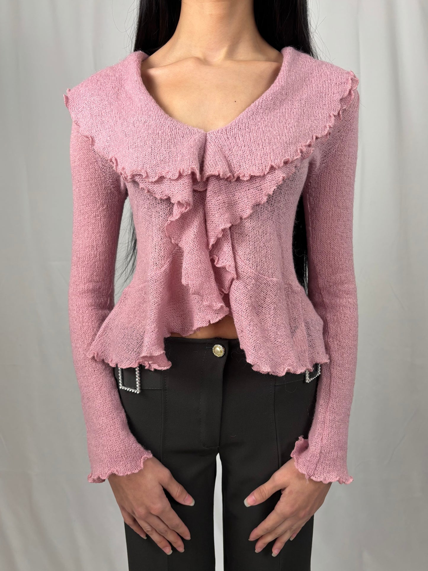 Pull à volants rose